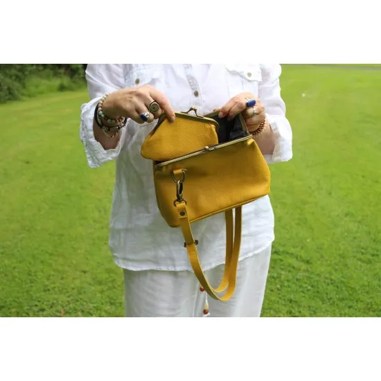Cross body yellow leather kiss lock handbag
